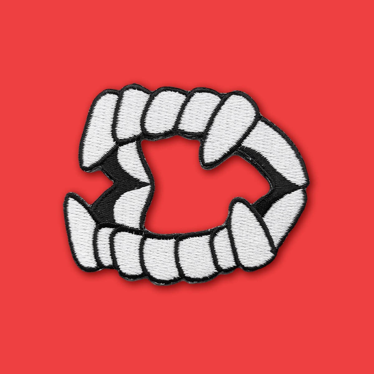 PLASTIC DRACULA TEETH PATCH - PACK OF 12 - Extreme Largeness Wholesale